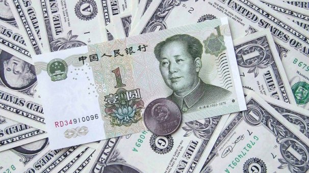Китай снижает курс юаня